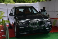 Nagarjuna Gifted BMW Car to Sindhu  title=